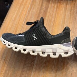 On Running Black and White Athletic Shoes